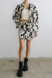 Tasha Cow Print Mini Skirt